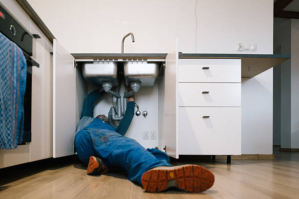 Professional Emergency Plumber technician working in Cascade, WI